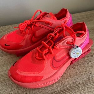 Nike Red and Pink Sneakers with Futuristic Design